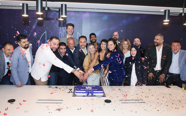 The SentinelOne team cuts the cake at the Dubai office opening